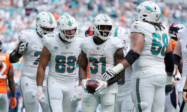 Raheem Mostert Celebrates One Of The Dolphins’ Many Touchdowns 
